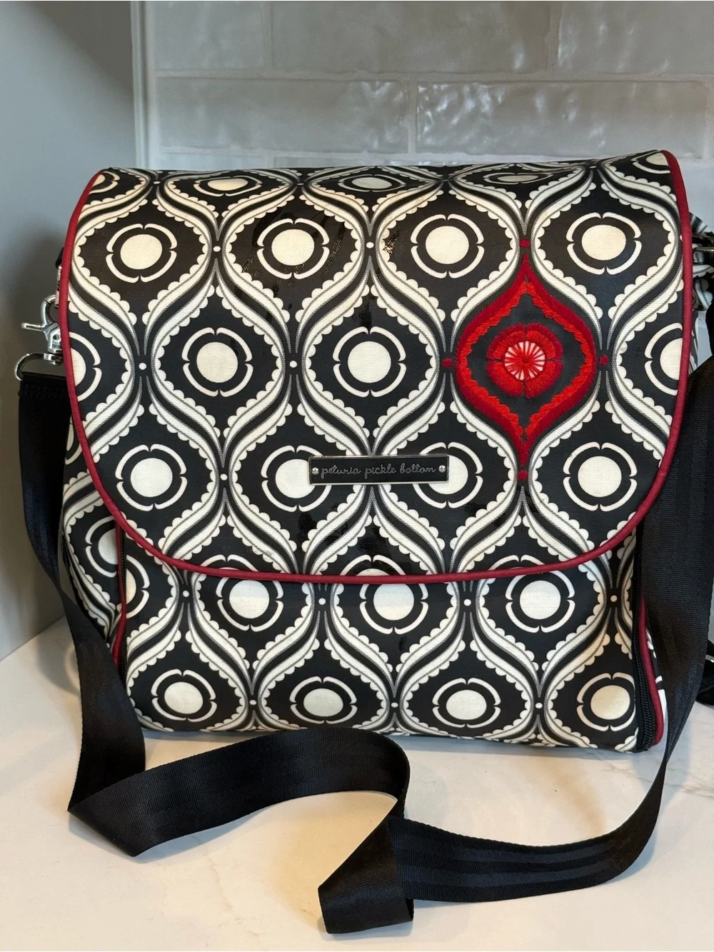 Petunia Pickle Bottom Black & White Geometric Baby Bag with Red Accent